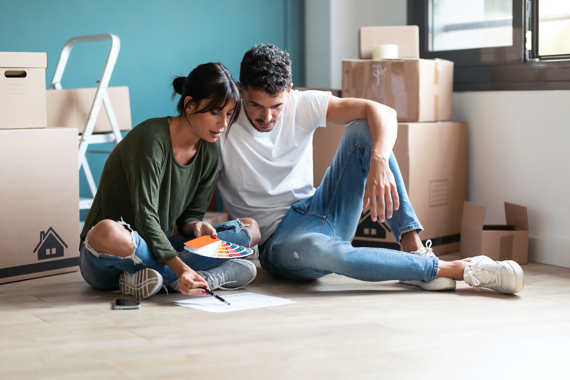 Homeowners choosing paint colours together