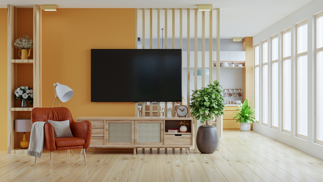 Modern living room with orange feature wall
